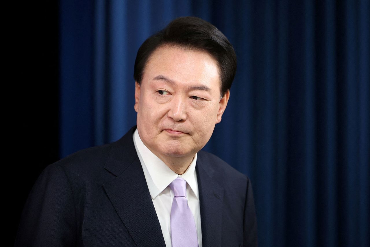 South Korean President Yoon Suk Yeol arrives for a press conference at the Presidential Office in Seoul, South Korea, on November 7.