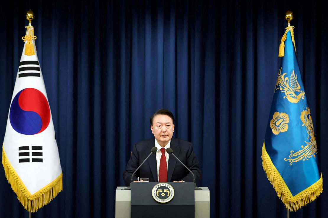 South Korea's former President Yoon Suk Yeol delivers a speech to declare martial law in Seoul on December 3, 2024.