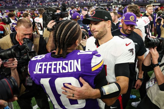 Minnesota Vikings wide receiver Justin Jefferson and Atlanta Falcons quarterback Kirk Cousins talk after their game in Minneapolis on December 8. Cousins joined the Falcons in the offseason after six seasons with the Vikings; Sunday was his first time playing in Minneapolis since his departure. The Falcons lost 42-21.