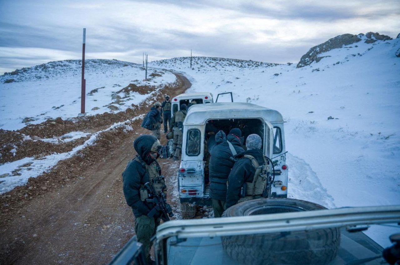 Israeli forces operate at a location given as Mount Hermon region, Syria, in this handout image released on December 9.