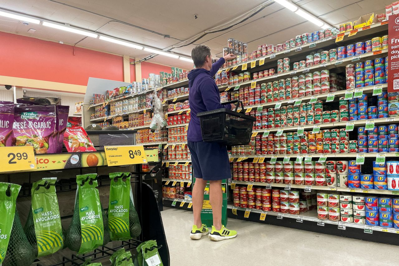 A person shops in an Albertsons supermarket in Seattle, Washington, on December 10.