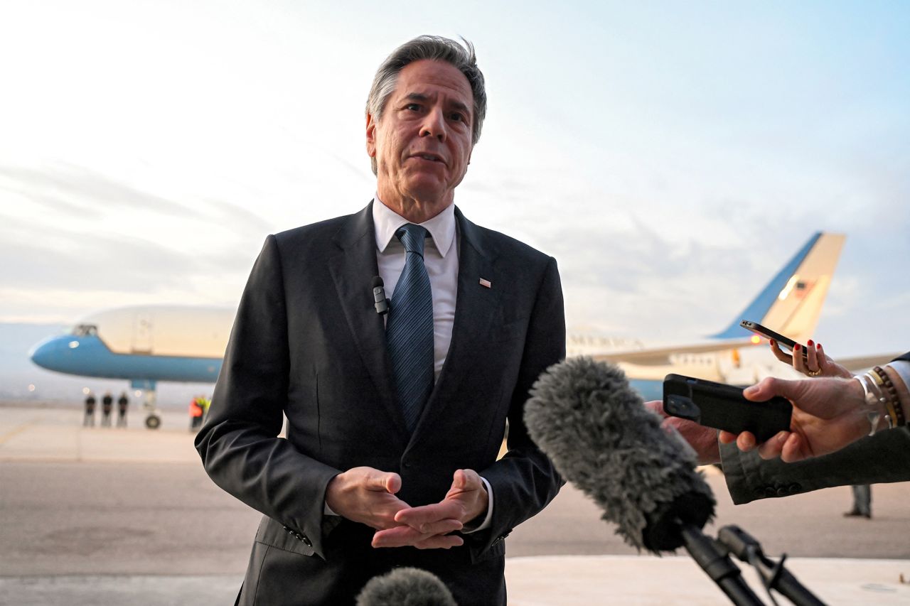 U.S. Secretary of State Antony Blinken speaks to reporters on the tarmac before his departure from King Hussein International Airport, Jordan, on December 12.