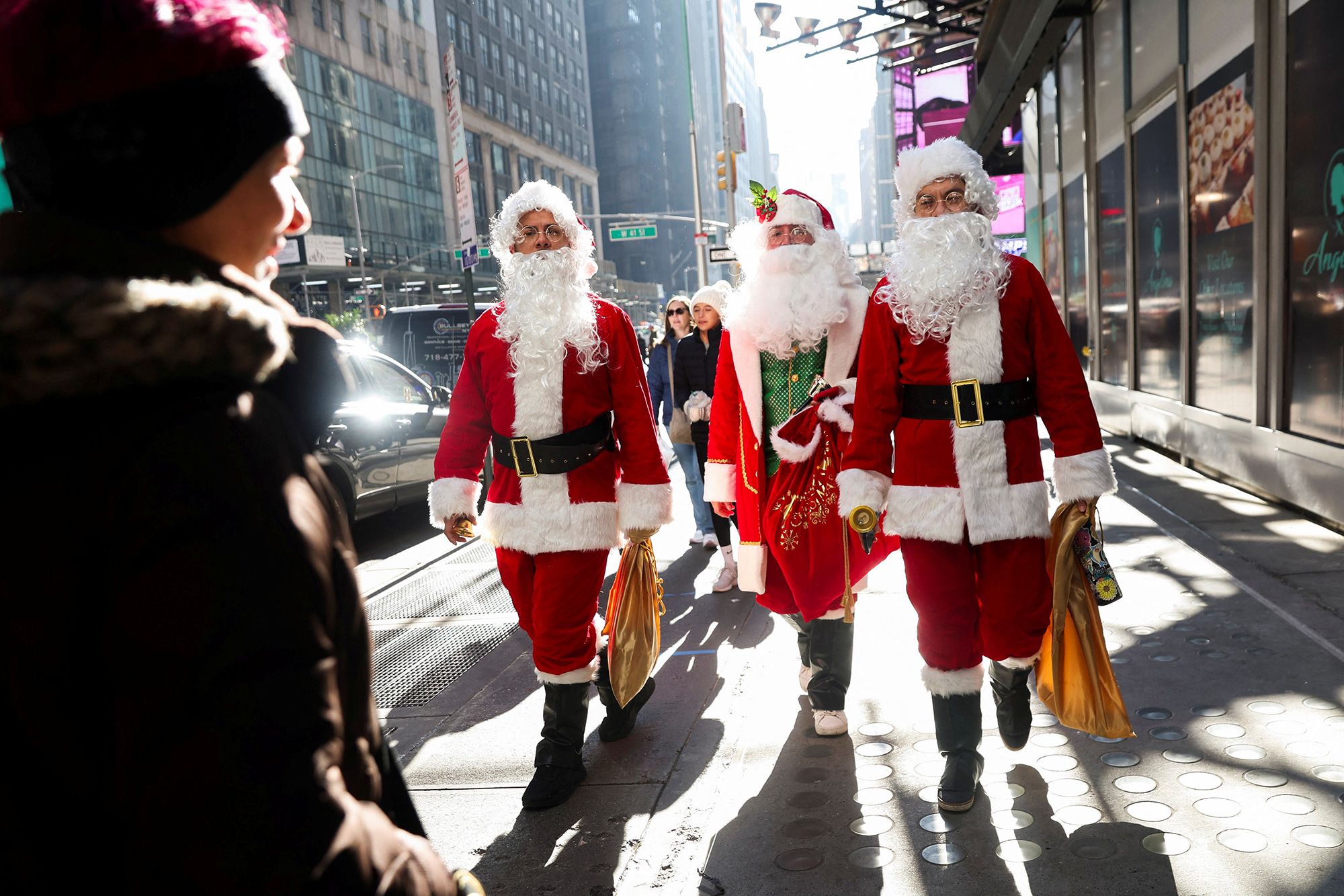 Santa's iconic suit makes him particularly imitable — leading to tens of thousands of people donning the holiday uniform for SantaCon in New York each year. But his outfit's origins are elusive, and took nearly a century to be decided upon.