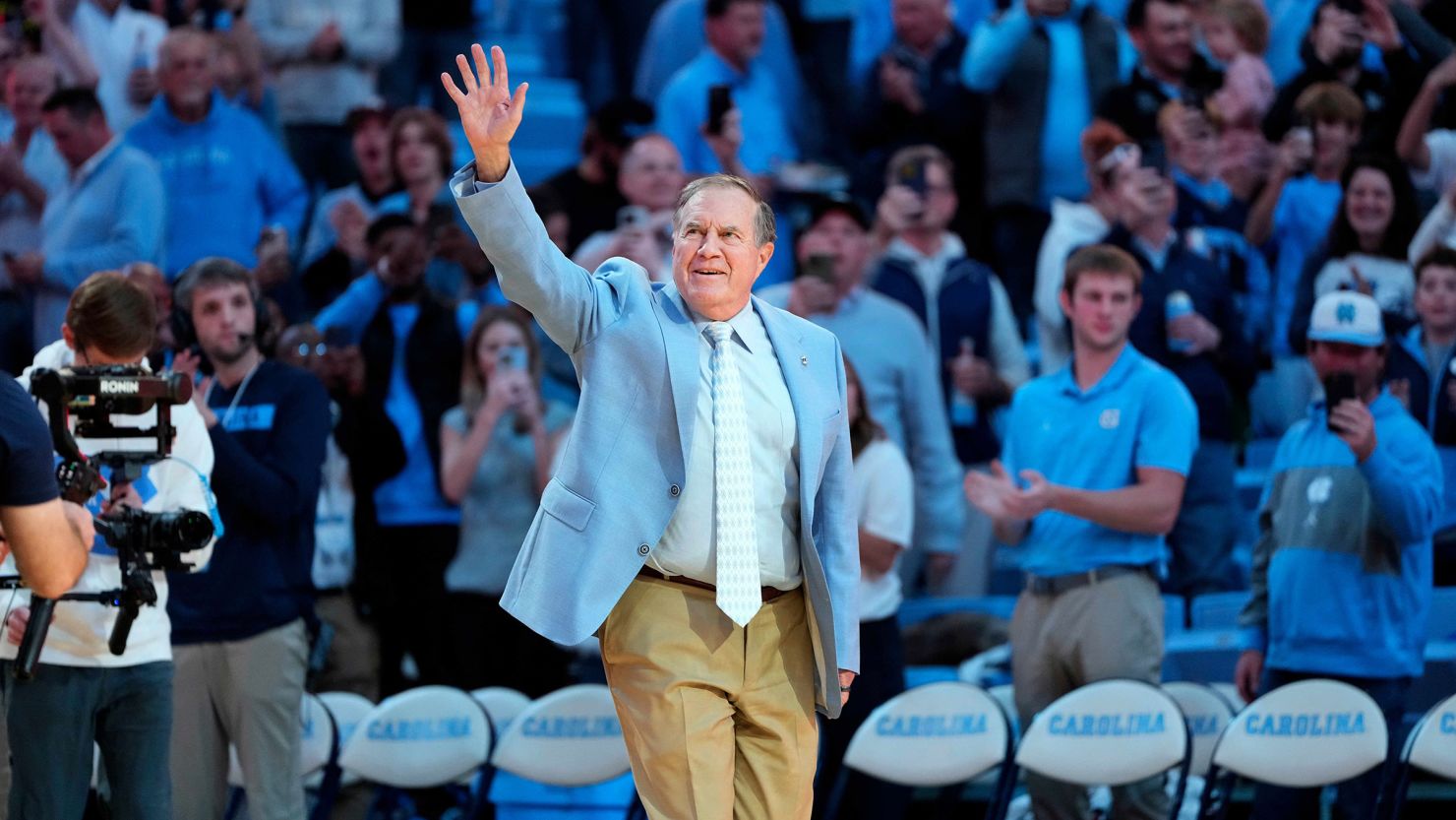 Bill Belichick gets enthusiastic reception at UNC basketball game having been unveiled as the new football coach | CNN