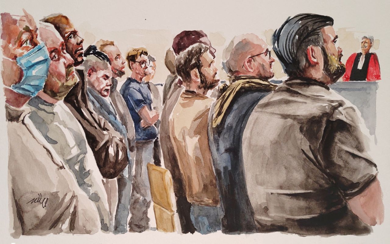 This courtroom sketch shows defendants during their trial alongside Dominique Pelicot at the courthouse in Avignon, France, on December 16.