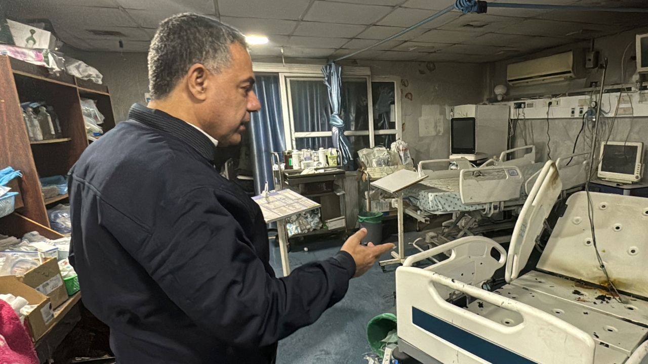 Hussam Abu Safiya, director of Kamal Adwan hospital, shows the damage inside the hospital in Beit Lahiya, in the northern Gaza Strip, on December 18, 2024.