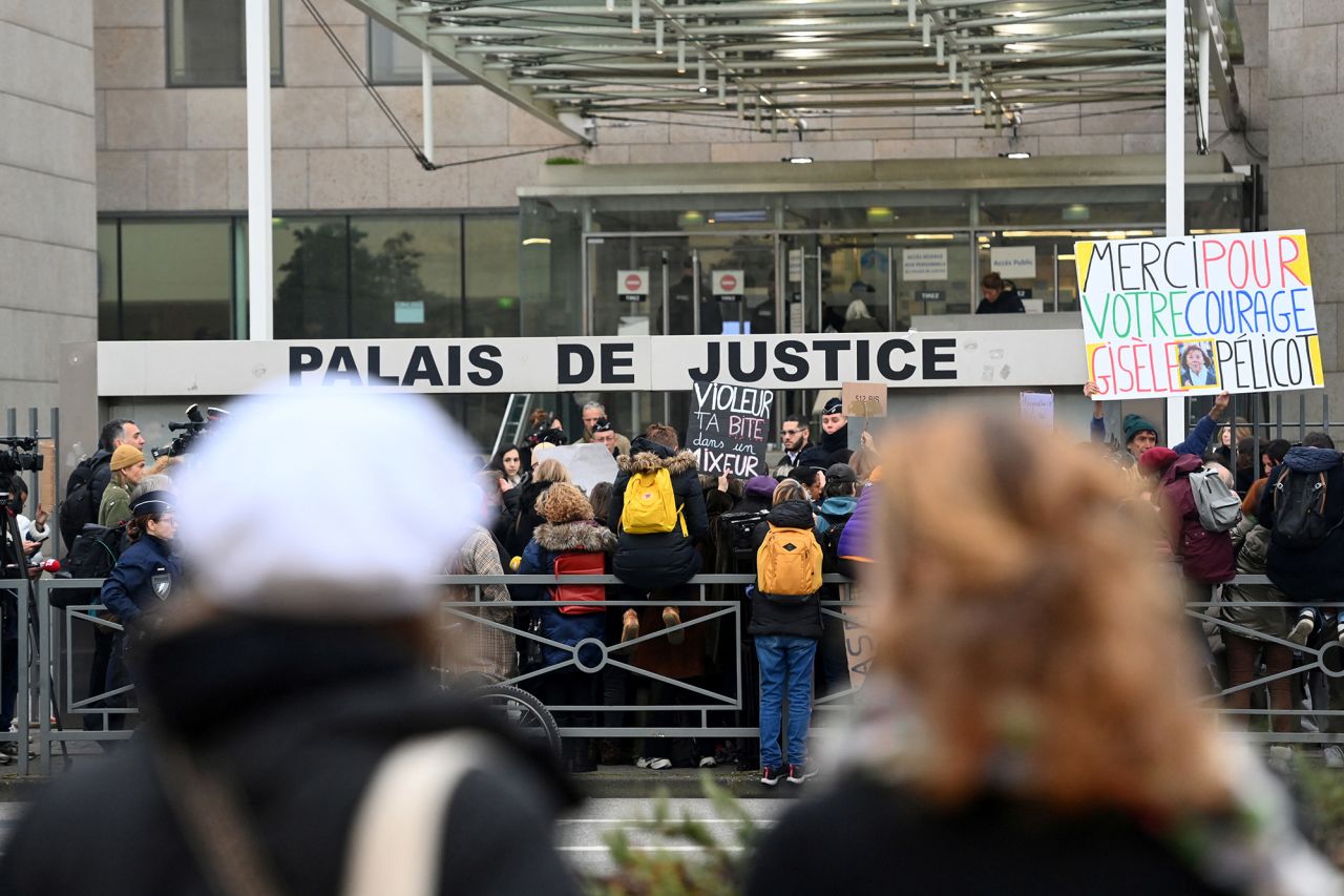 People gather in support of Frenchwoman Gisele Pelicot in front of the courthouse in Avignon, France, on December 19. The slogan reads " Thank you for your courage Gisele Pelicot".