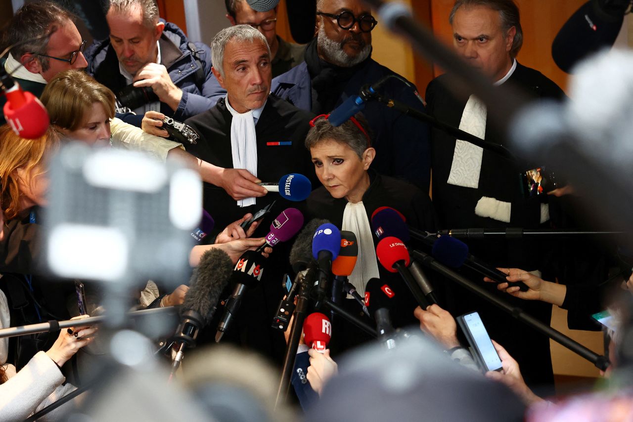 Beatrice Zavarro, the lawyer of Dominique Pelicot, talks to journalists after the verdict at the courthouse in Avignon, France, on December 19.