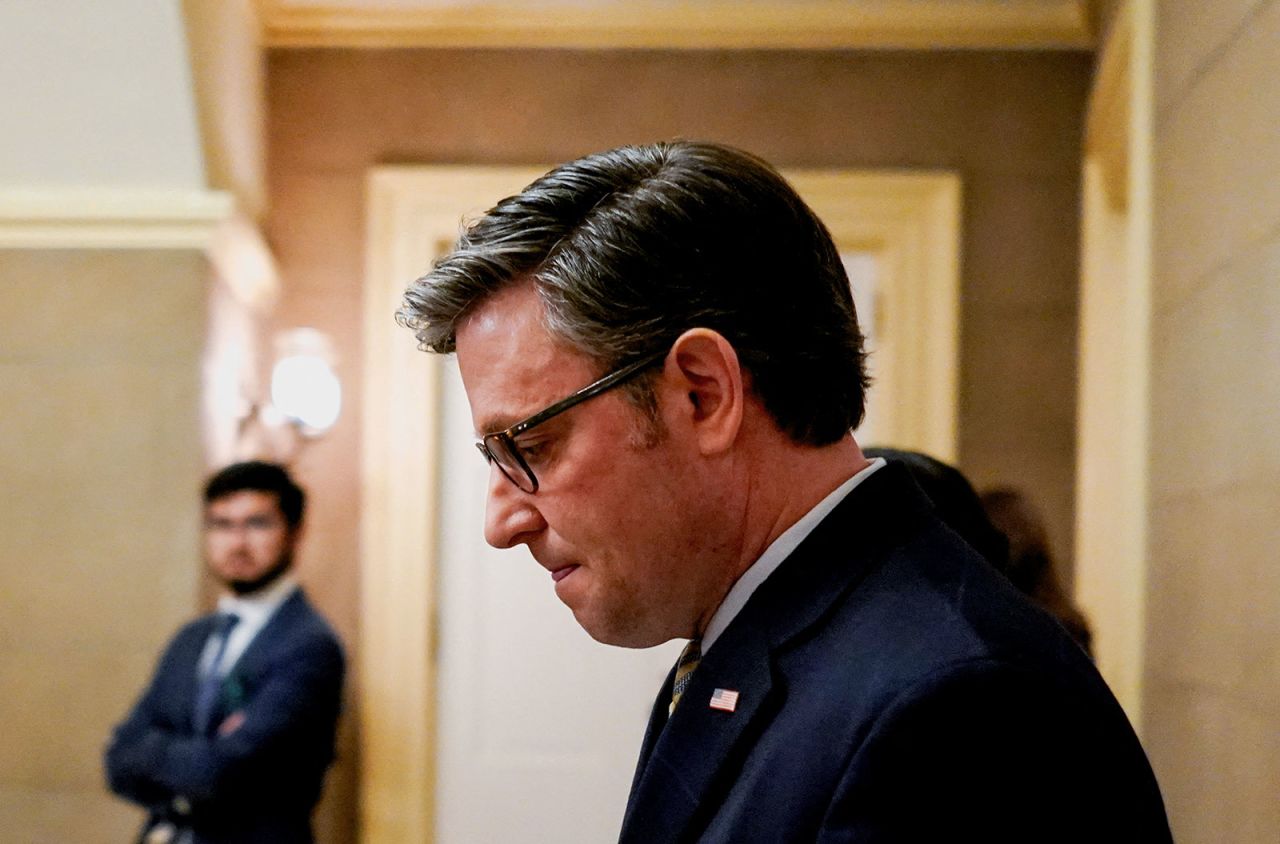 US Speaker of the House Mike Johnson walks following the passage of a spending legislation to avert a government shutdown on Capitol Hill in Washington on December 20, 2024.