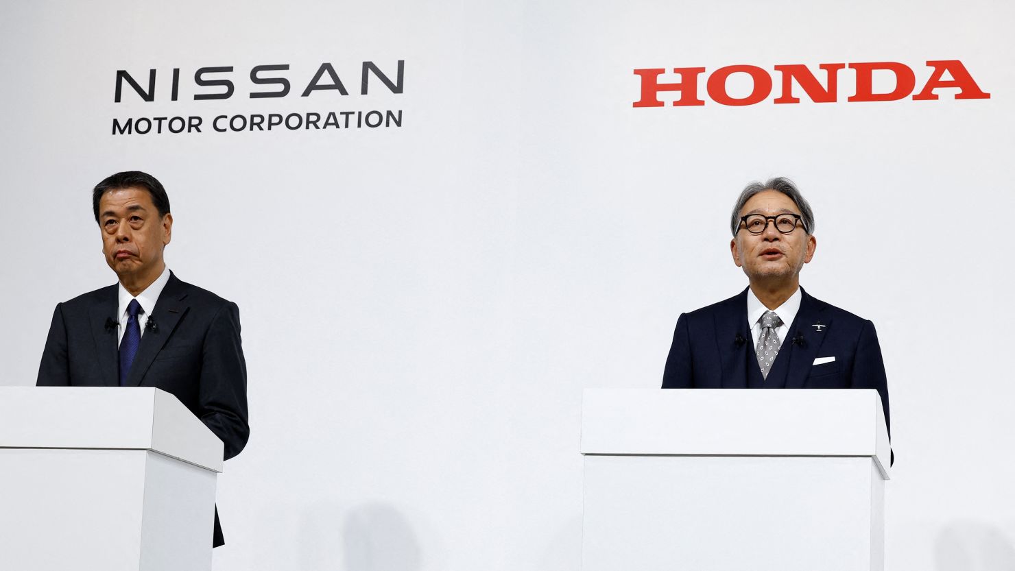 Makoto Uchida, Director, Representative Executive Officer, President and CEO of Nissan Motor Corporation and Toshihiro Mibe, Director, President and Representative Executive Officer of Honda, hold a joint press conference on their merger talks, in Tokyo, Japan, December 23, 2024. REUTERS/Kim Kyung-Hoon