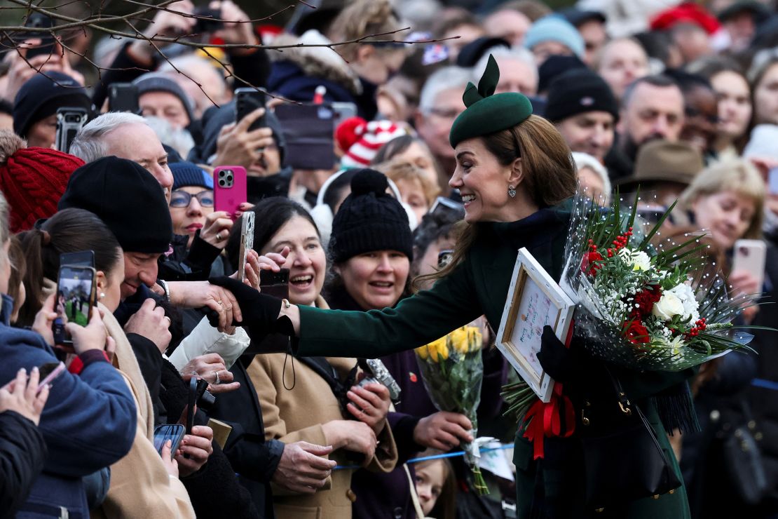 Catherine, Princess of Wales, greets people on the day of the Royal Family's Christmas Day service at St. Mary Magdalene's church, as the Royals take residence at the Sandringham estate in eastern England, Britain December 25, 2024. REUTERS/Toby Melville