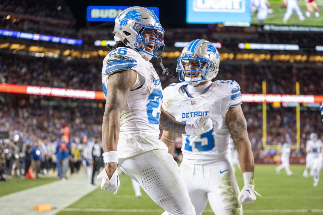 December 30, 2024; Santa Clara, California, USA; Detroit Lions running back Jahmyr Gibbs (26) celebrates with running back Craig Reynolds (13) after scoring a touchdown during the fourth quarter at Levi's Stadium. Mandatory Credit: Kyle Terada-Imagn Images