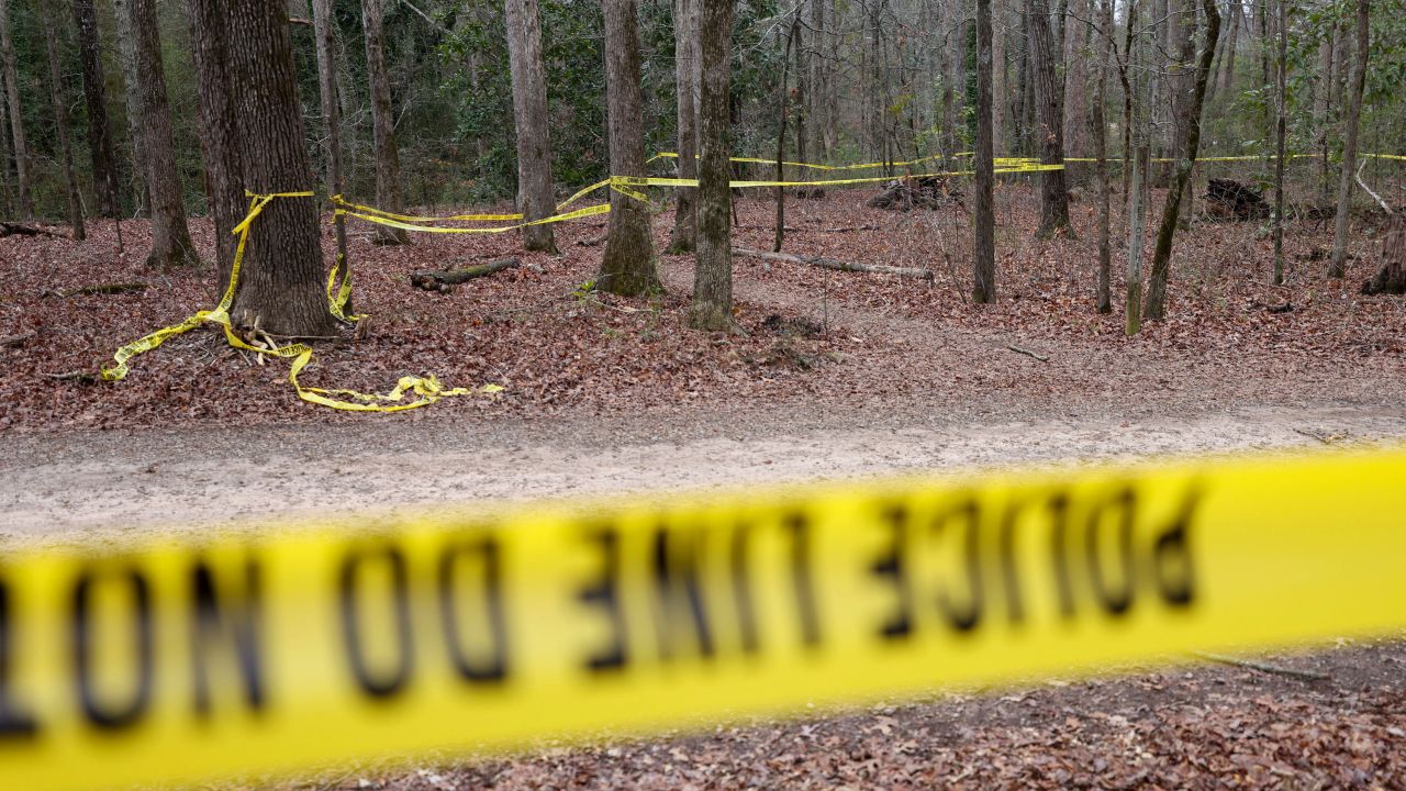 February 24, 2024: Police tape ropes off the crime scene on a trail behind Lake Herrick in Athens, Georgia, at the University of Georgia on Feb. 23, 2024. (Credit Image: Â© Jason Getz/The Atlanta Journal-Constitution via ZUMA Press Wire)