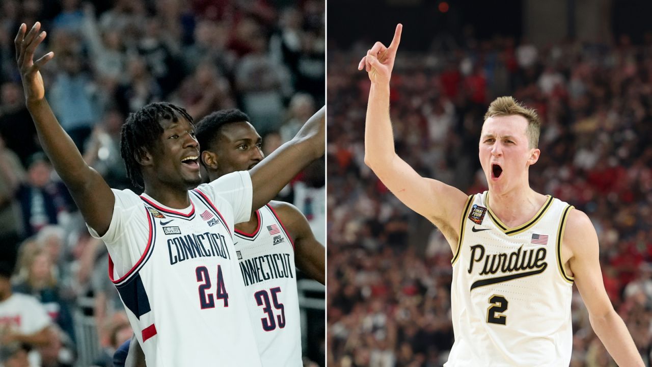 UConn center Youssouf Singare #24 and Fletcher Loyer #2 of the Purdue Boilermakers celebrate their victories Saturday.