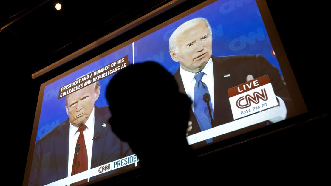 A man watches the CNN presidential debate during a watch party at Union Pub in Washington, DC, on June 27, 2024.