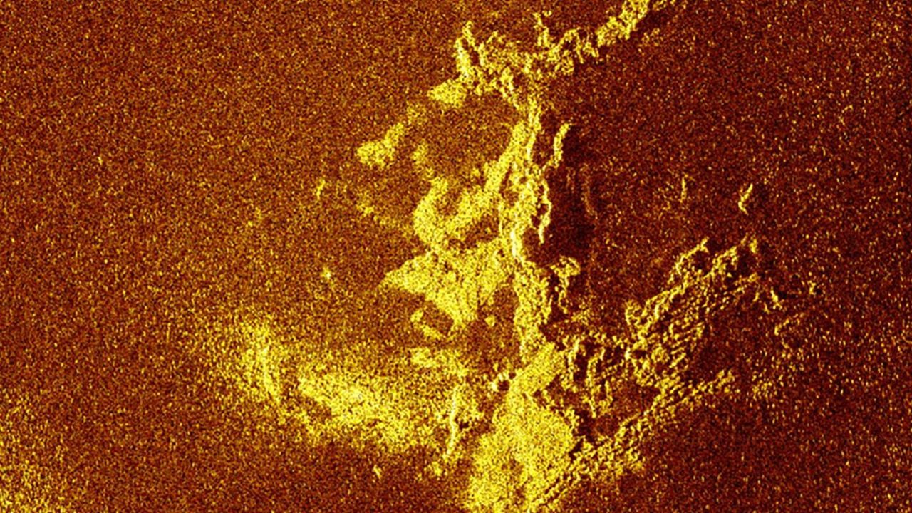 It turned out to be a rock formation, above, when they revisited the site in November the same year.