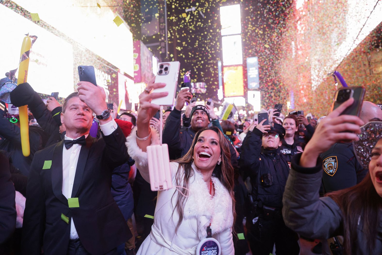 Confetti falls onto the crowd in Times Square.