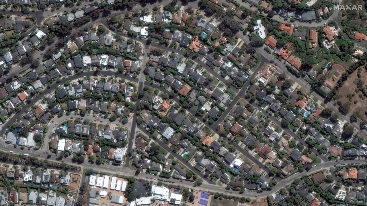 A satellite image shows houses in Pacific Palisades before Palisades Fire, in California, U.S., October 20, 2024. Maxar Technologies/Handout via REUTERS NO RESALES. NO ARCHIVES. THIS IMAGE HAS BEEN SUPPLIED BY A THIRD PARTY. MANDATORY CREDIT. MUST NOT OBSCURE LOGO.