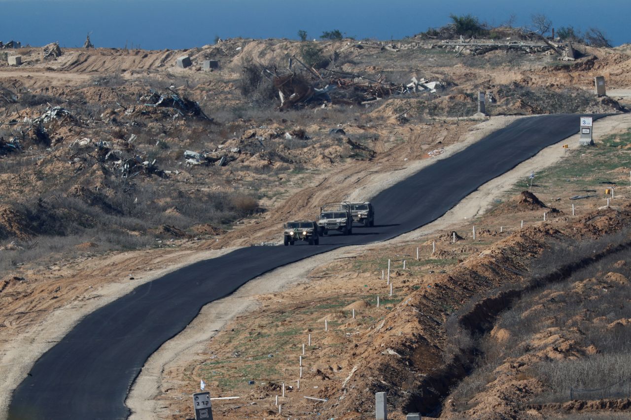 The Israeli military drives vehicles inside Gaza, as seen from southern Israel, on Saturday.