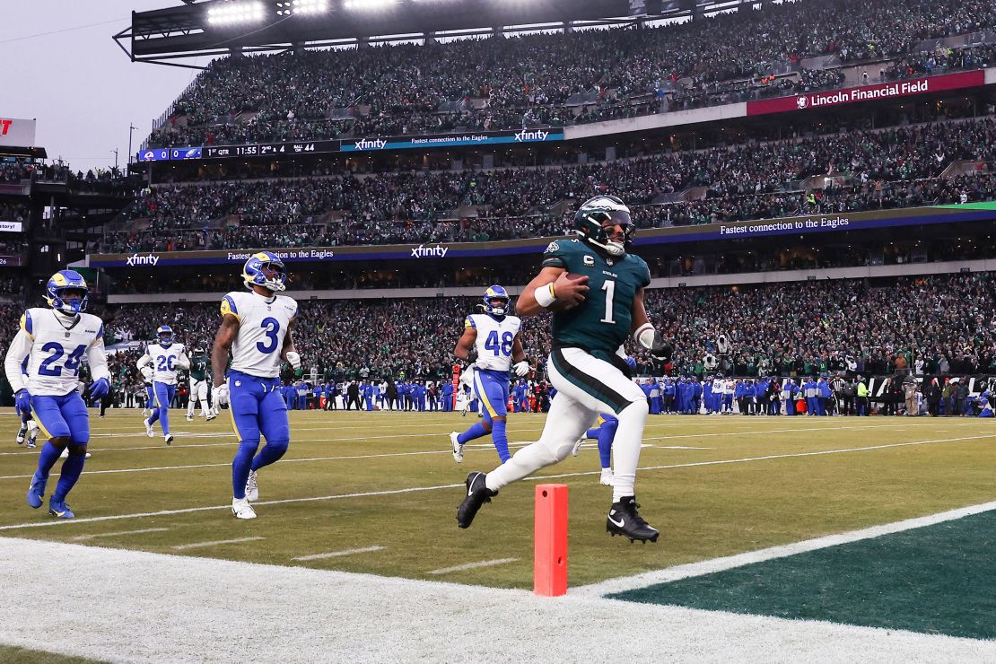 Jalen Hurts runs in a touchdown against the Los Angeles Rams in the first half of the two teams' 2025 NFC divisional round clash.