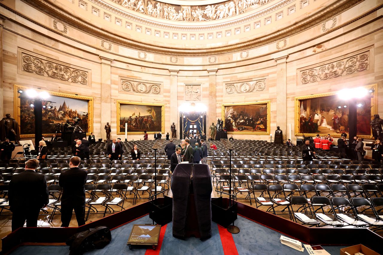 Staff prepare for the inauguration of President-elect Donald Trump at the Capitol Rotunda on Monday in Washington, DC.