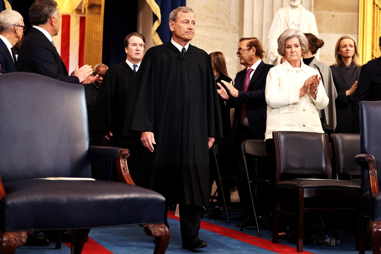 Supreme Court Justice Brett Kavanaugh and Chief Justice John Roberts enter the Capitol Rotunda in Washington, DC on Monday.