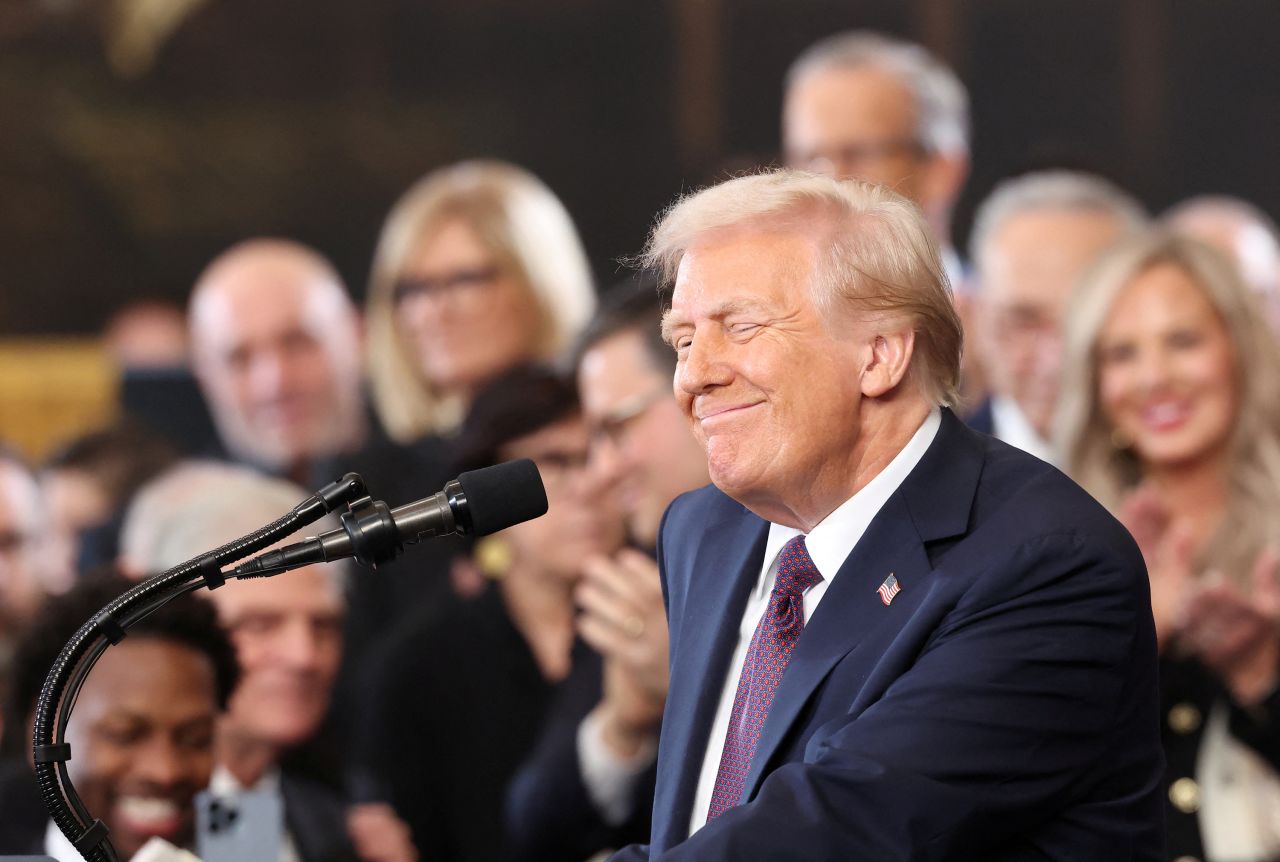 President Donald Trump reacts after being sworn in to office on Monday.