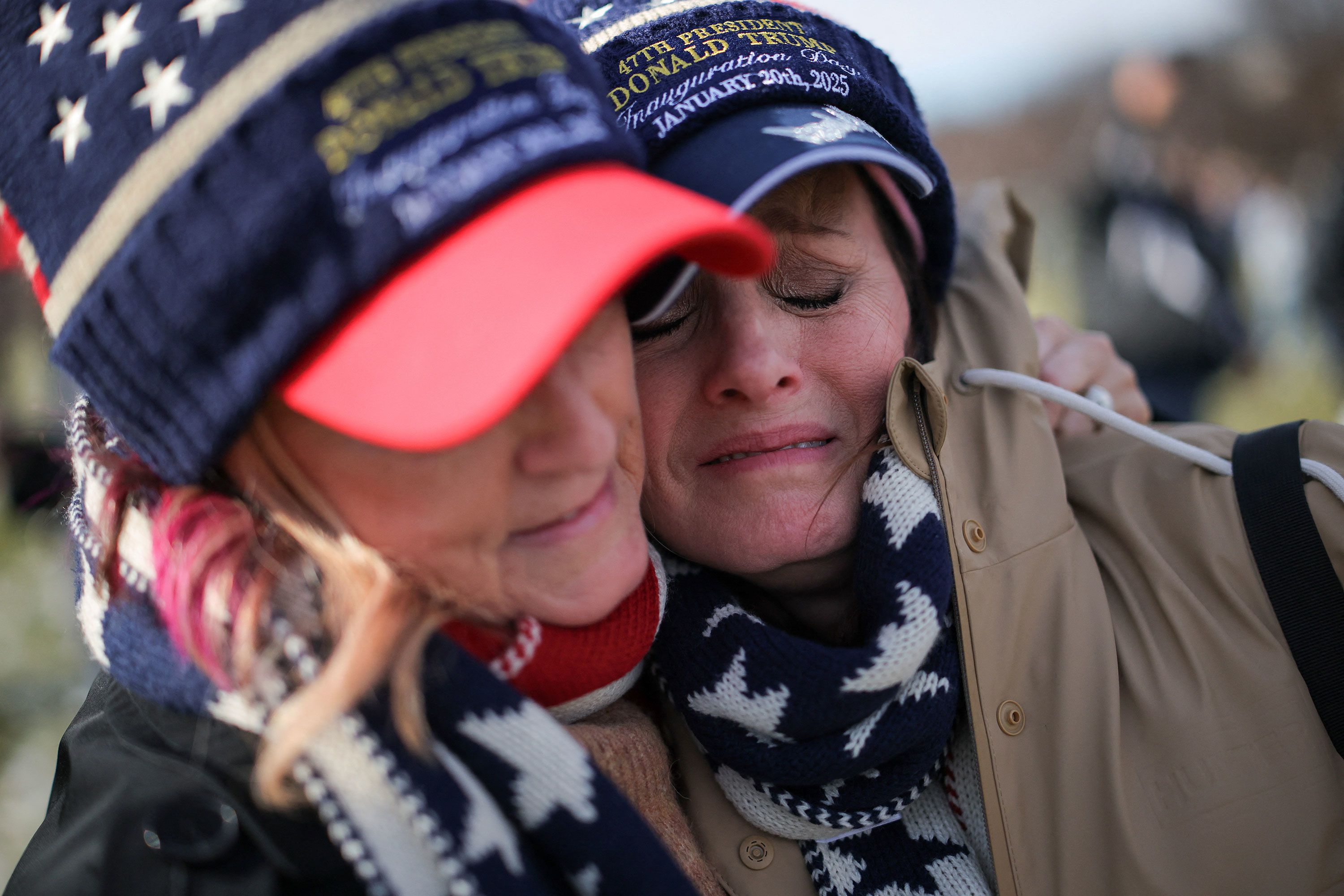 Tammy Holt and Vicky Askew react outside the Capitol after Trump was sworn in on Monday.