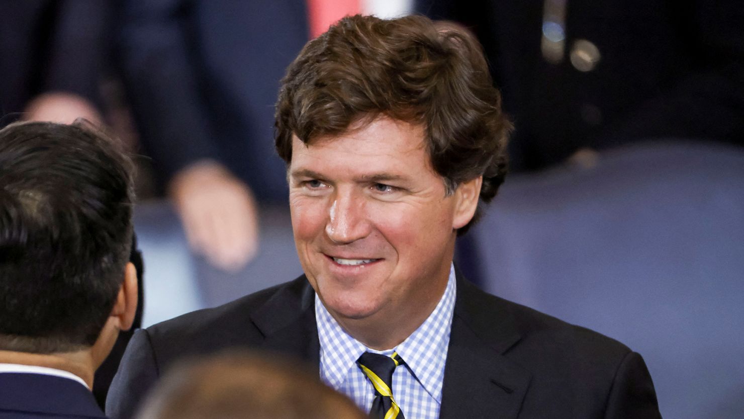 Tucker Carlson, pictured above, experienced a surge in viewership for his podcast last week amid an intra-MAGA feud over Trump's foreign policy.