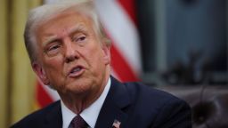 US President Donald Trump speaks as he issues executive orders in the Oval Office of the White House on Monday.