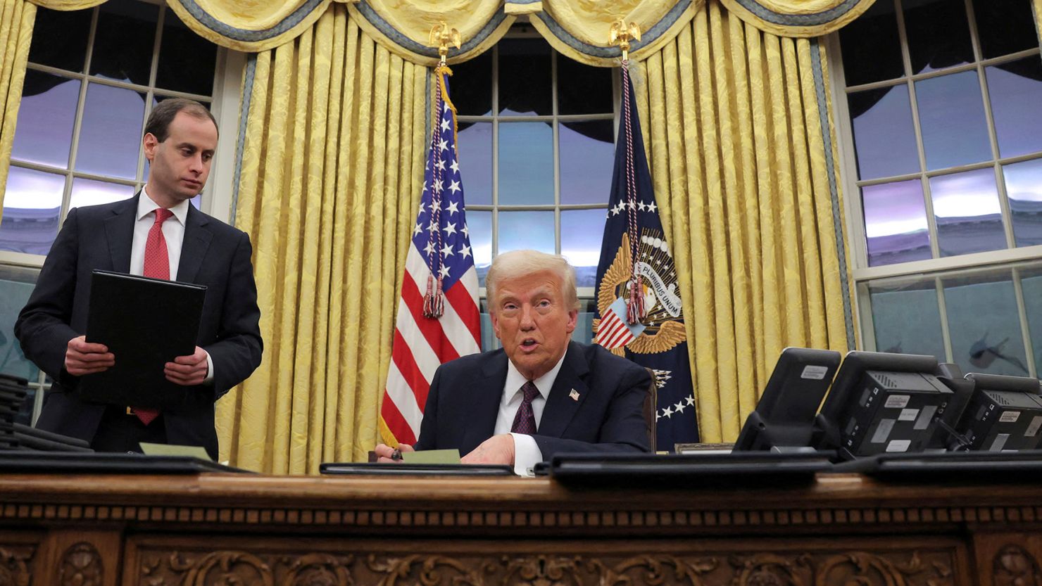 President Donald Trump speaks Monday as he issues executive orders and pardons from the Oval Office of the White House.