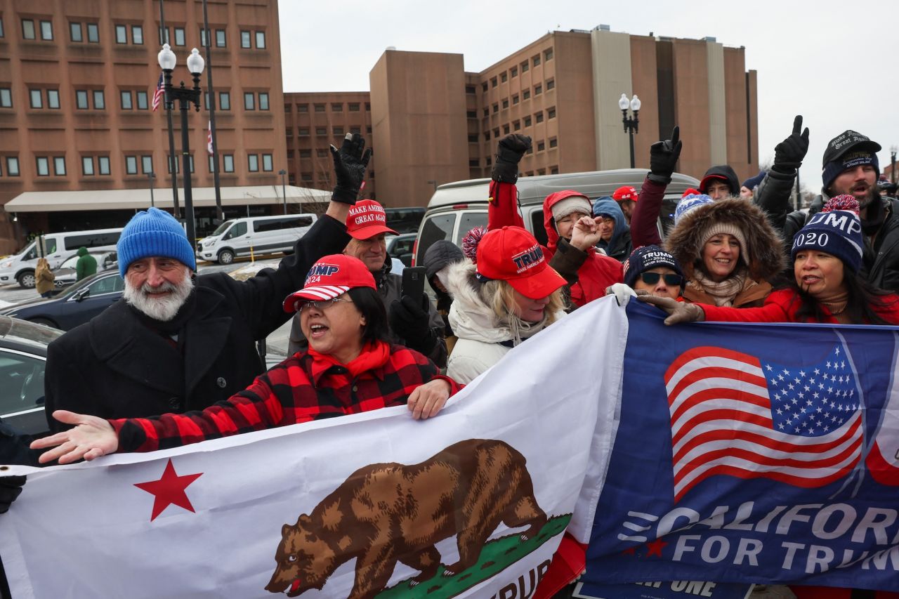 People wait for the release of those serving time related to their involvement in the January 6 attack on the Capitol in Washington, DC, on Tuesday.