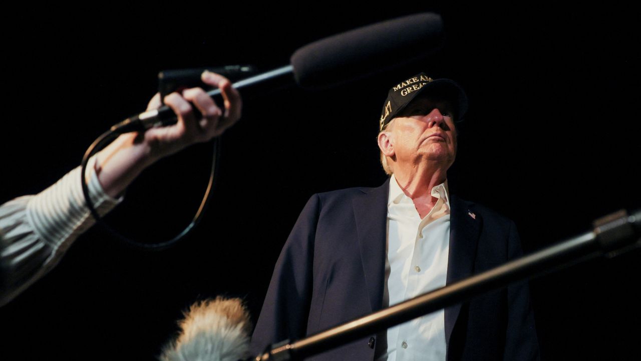 U.S. President Donald Trump looks on next to members of the press before boarding Air Force One as he departs for Las Vegas at Los Angeles International Airport in Los Angeles, California, U.S., January 24, 2025. REUTERS/Leah Millis