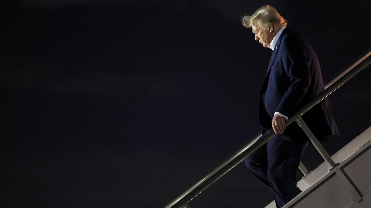 U.S. President Donald Trump deboards the plane as he arrives at Miami International Airport in Miami, Florida, U.S., January 25, 2025. REUTERS/Leah Millis