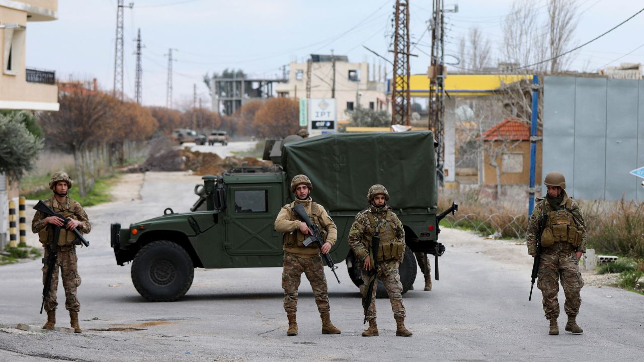 Members of the Lebanese army secure the area in Burj al-Muluk, near the southern Lebanese village of Kfar Kila, on Sunday.