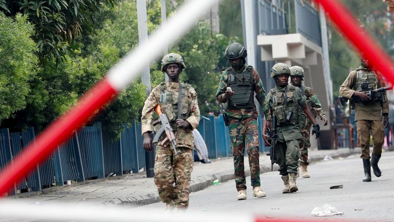 Residents of Congo’s besieged city live in fear as government forces battle rebel takeover