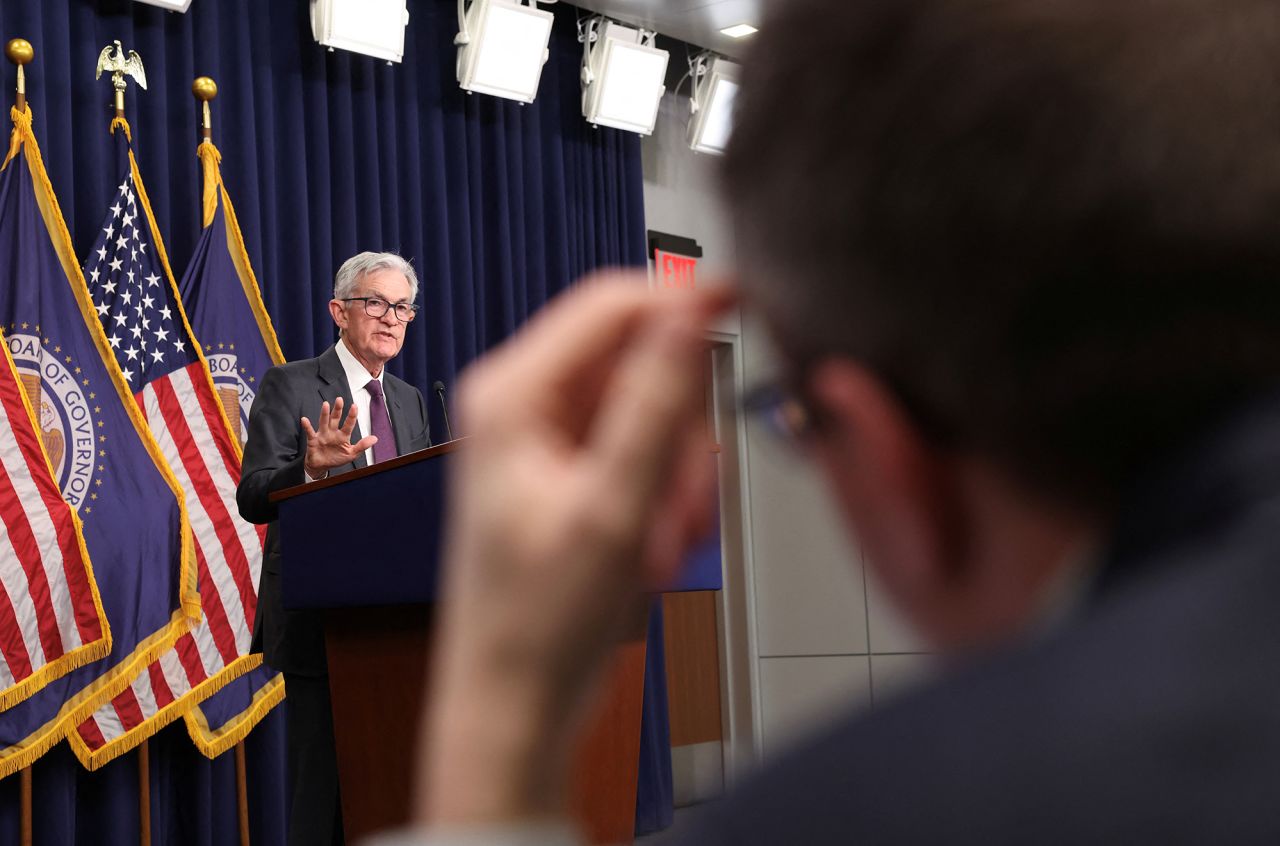 A reporter listens as Federal Reserve Chair Jerome Powell answers a question during a press conference following a two-day meeting of the Federal Open Market Committee on interest rate policy in Washington on January 29.