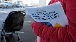 Workers pass out flyers for a free "Do You Know Your Rights As An Immigrant" workshop at the food pantry run by La Colaborativa, serving the largely immigrant and working-class residents of Chelsea, Massachusetts, U.S., January 29, 2025. REUTERS/Brian Snyder