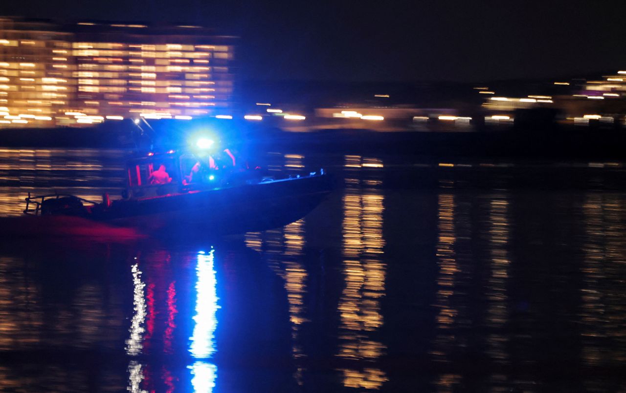 A search and rescue boat operates along the Potomac River on Wednesday.