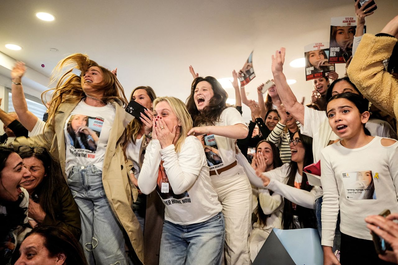 Family members and supporters of Israeli hostage Agam Berger react as they watch a broadcast of Berger during her release, in Holon, Israel, on Thursday.