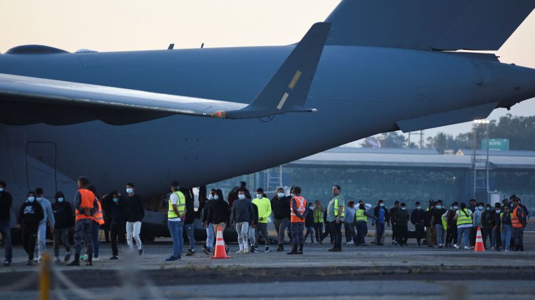 Guatemalan migrants arrive on a deportation flight from the U.S., at La Aurora Air Force Base in Guatemala City, Guatemala January 30, 2025. REUTERS/Cristina Chiquin