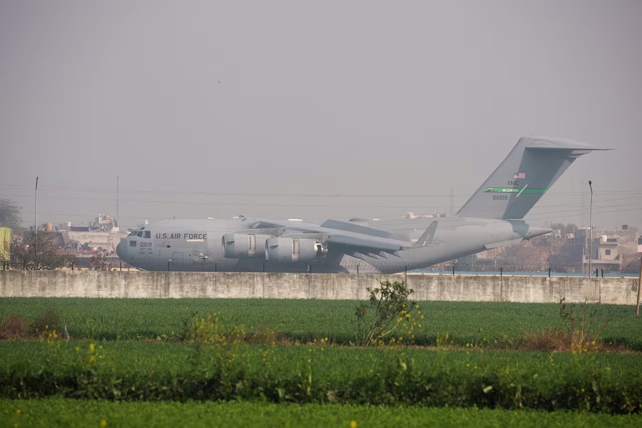 A US military plane deporting Indian immigrants lands in Amritsar, India, on Wednesday.