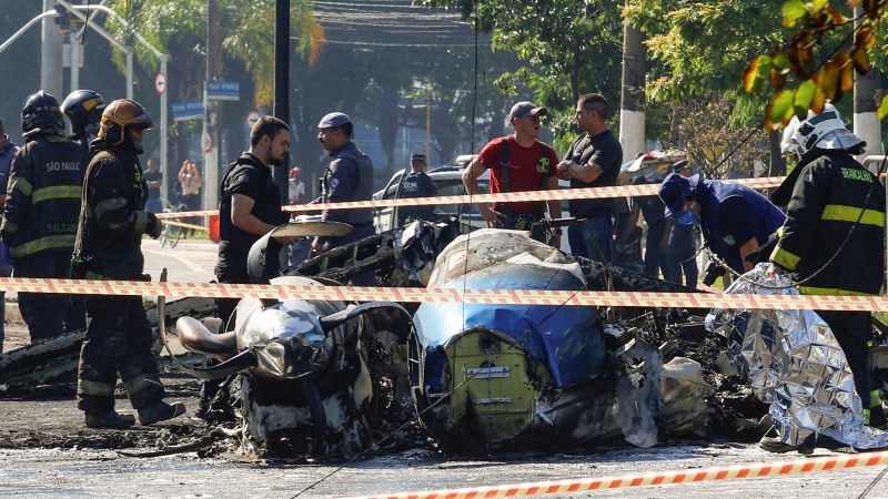 Brazil plane crash: Two killed after small aircraft crashes into bus in São Paulo