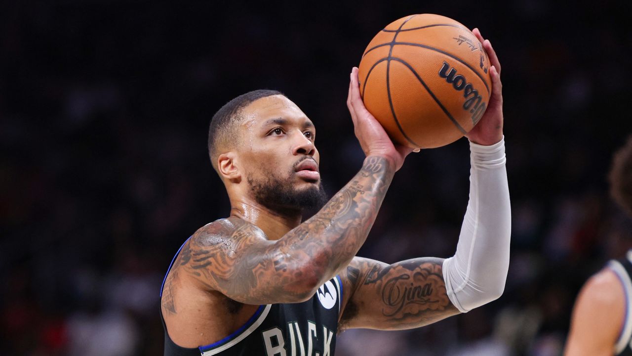 Feb 7, 2025; Atlanta, Georgia, USA; Milwaukee Bucks guard Damian Lillard (0) shoots a free throw against the Atlanta Hawks in the first quarter at State Farm Arena.