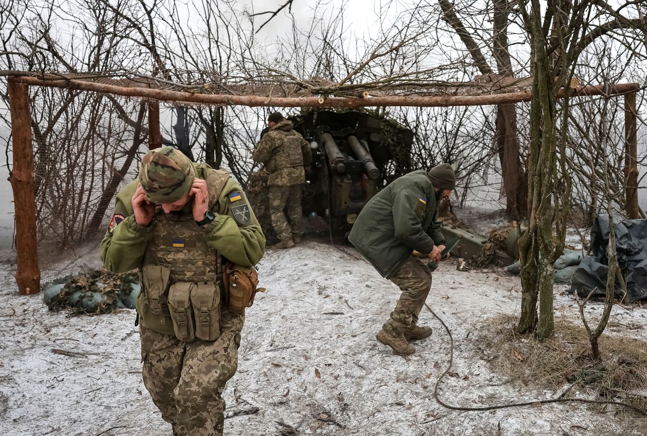 Ukrainian Servicemen fire a D-20 howitzer toward Russian troops near the frontline town of Pokrovsk in Donetsk region, Ukraine on February 6.