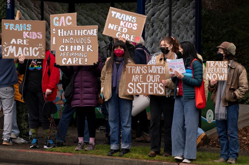 Demonstrators gather for a rally in support of trans youth at Seattle Children's hospital February 8, following President Donald Trump’s executive order that denies federal funding for pediatric gender-affirming care.
