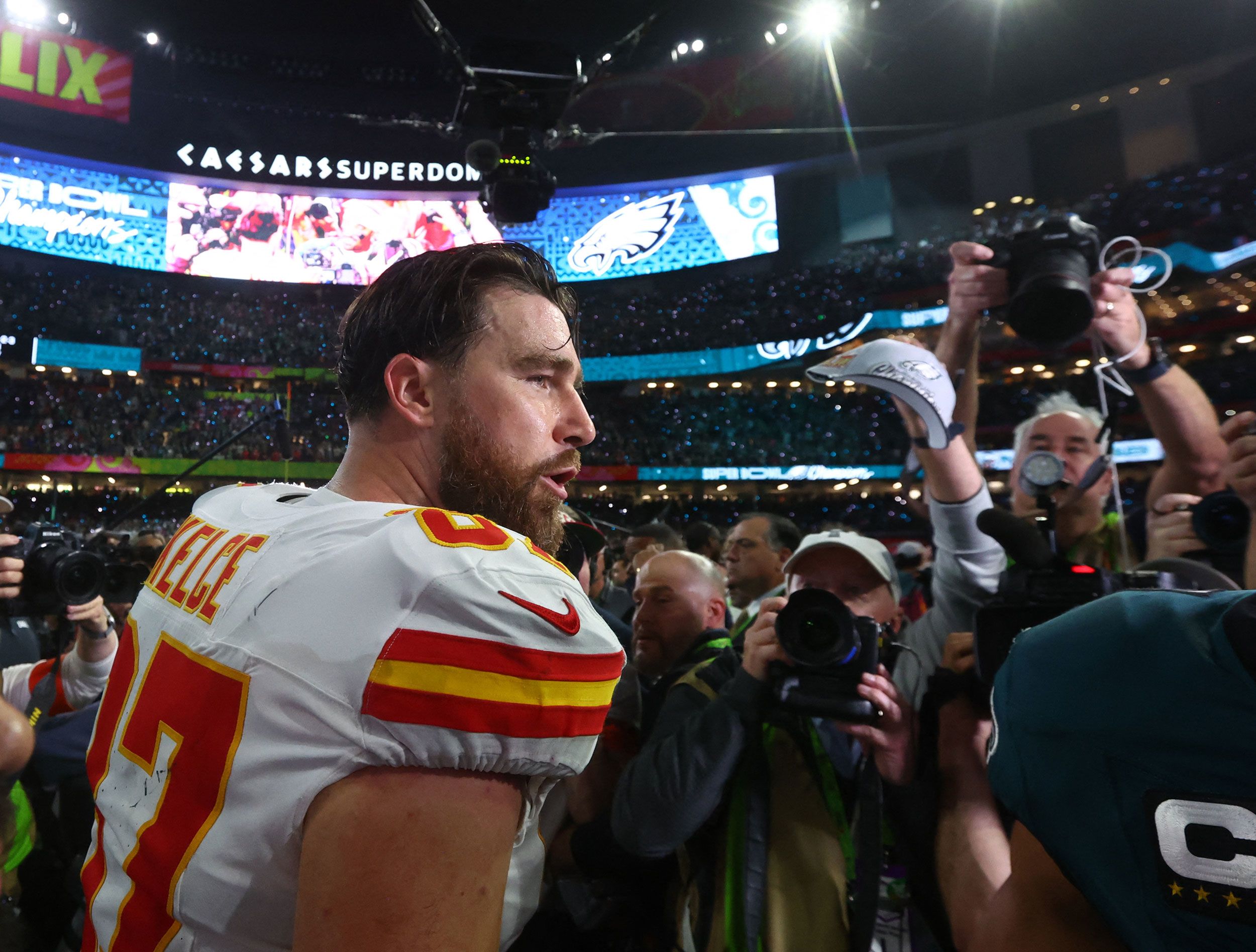 Chiefs tight end Travis Kelce walks off the field after the game.