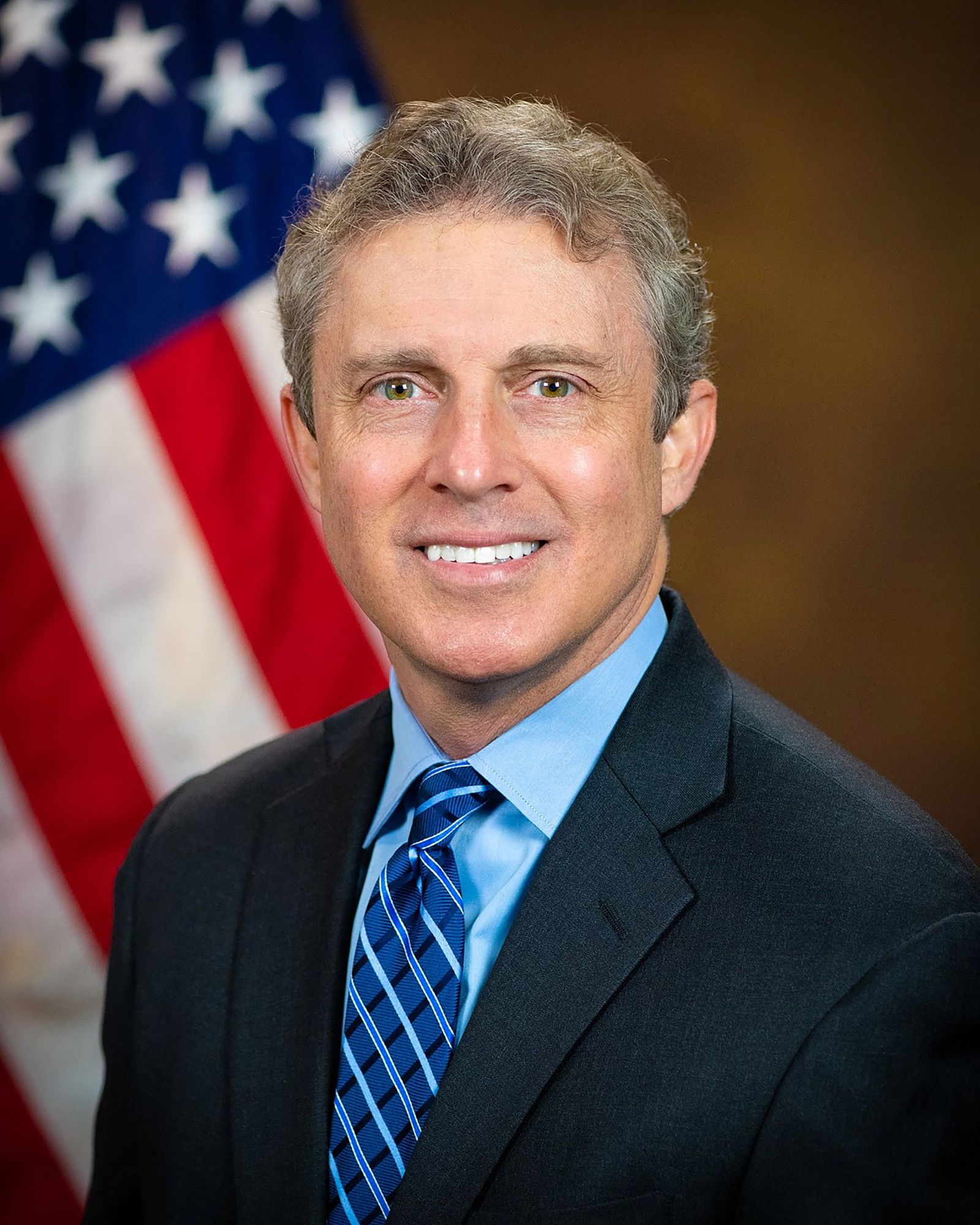 Special Counsel of the US Office of Special Counsel Hampton Dellinger poses for a portrait in an undated handout image.