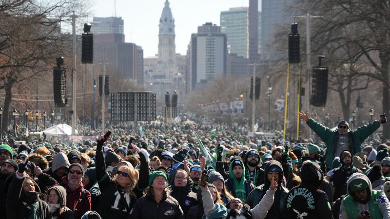 Cigars, confetti and brotherly love: Eagles celebrate Super Bowl victory with open-air bus parade through Philadelphia