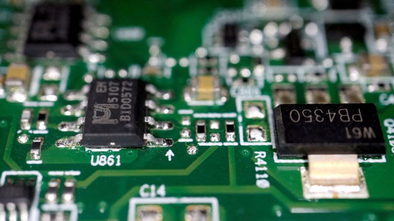 Semiconductor chips are seen on a printed circuit board in this photo illustration taken on February 17, 2023.